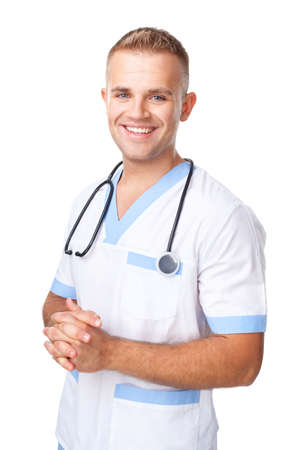 Portrait of happy smiling young doctor in uniform isolated on white backgroundの写真素材