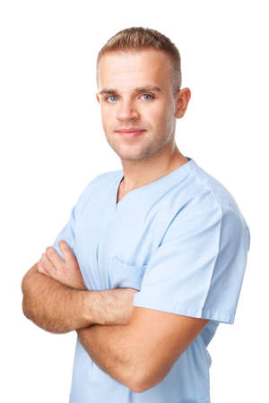 Portrait of happy smiling young male nurse in uniform isolated on white backgroundの写真素材