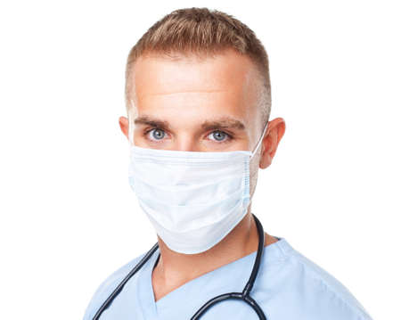 Portrait of young medical doctor in mask isolated on white backgroundの写真素材