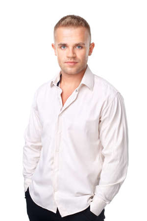 Portrait of  happy smiling young man wearing a white shirt isolated on white backgroundの写真素材