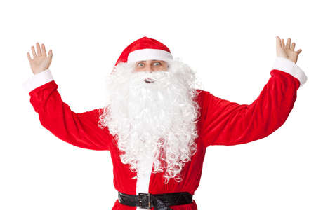 Santa Claus shocked with his hands up isolated on white backgroundの写真素材