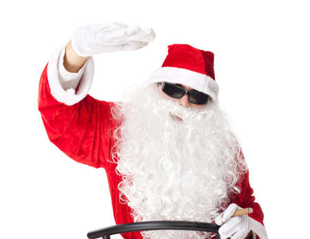 Santa Claus showing rap gesture , wearing sunglasses and smoking a cigar isolated on white backgroundの写真素材