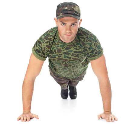 Young army soldier doing push up isolated on white background Front view