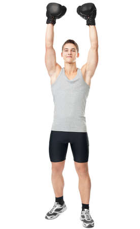Full length portrait of boxer champion enjoying his victory isolated on white backgroundの写真素材