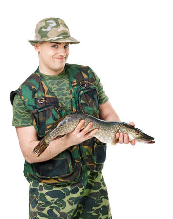Portrait of a young happy fisherman with his catch isolated on white backgroundの写真素材