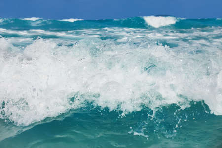 tropical sea waves and water foamの写真素材