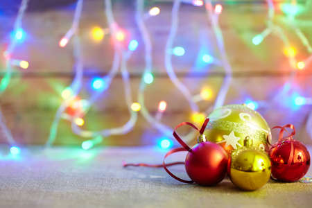 Christmas baubles on lights bokeh background with copy space