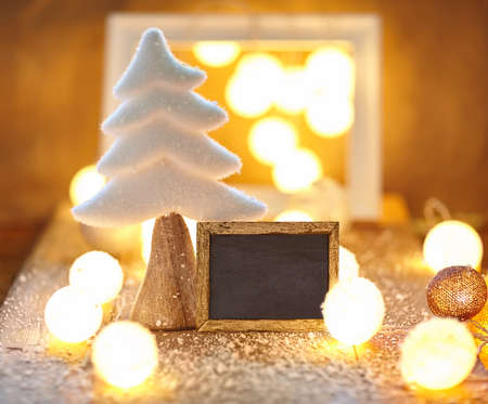 Christmas greeting card with empty chalkboardの写真素材