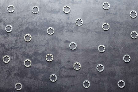 Abstract metal screw nuts backgroundの写真素材