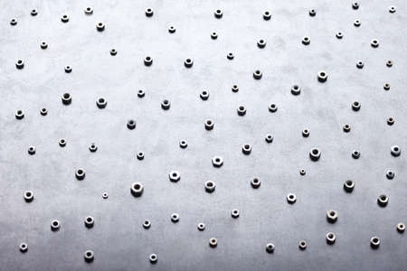 Abstract metal screw nuts backgroundの写真素材