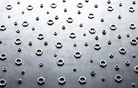 Abstract metal screw nuts backgroundの写真素材