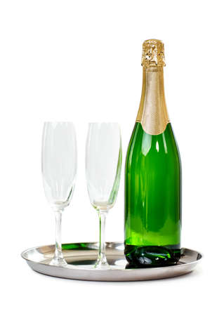 Champagne bottle with glasses on the tray isolated on white background. Celebration conceptの写真素材