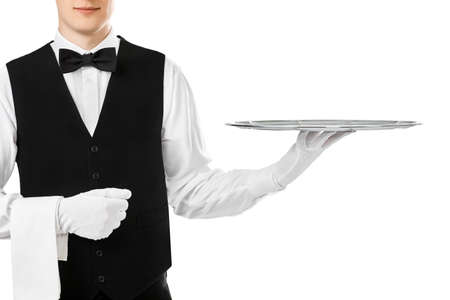 Elegant waiter holding empty silver tray on hand isolated on white backgroundの写真素材