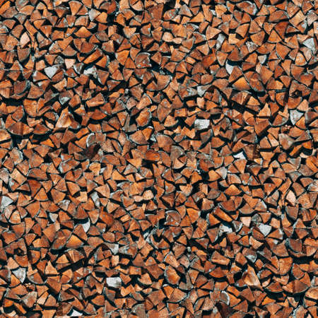 Pile of natural wood logs seamless backgroundの写真素材