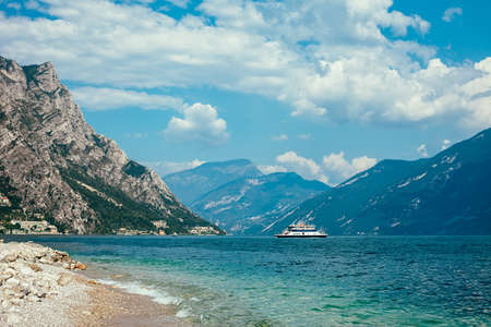 Scenic landscape of beautiful Garda lake and mountains, Italy. Nature backgroundの写真素材