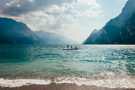Scenic landscape of beautiful Garda lake and mountains, Italy. Nature backgroundの写真素材