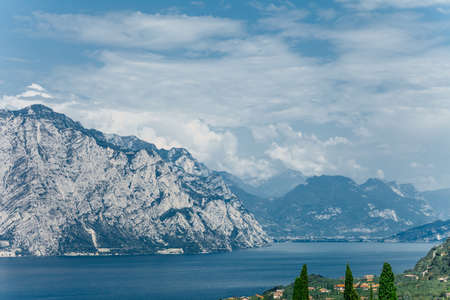 Scenic landscape of beautiful Garda lake and mountains, Italy. Nature backgroundの写真素材