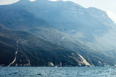 Scenic landscape of beautiful Garda lake and mountains, Italy. Nature backgroundの写真素材