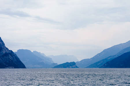 Scenic landscape of beautiful Garda lake and mountains, Italy. Nature backgroundの写真素材