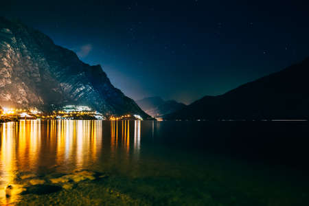 Scenic night view of illuminated town Limone sul Garda, Italy. Travel backgroundの写真素材