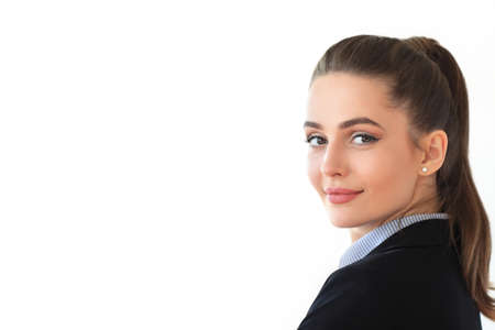 Portrait of young beautiful business woman on white background. Copy spaceの写真素材