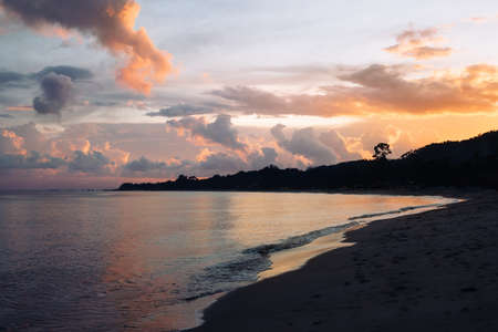 Beautiful colorful sky and calm sea on sunset. Travel backgroundの写真素材