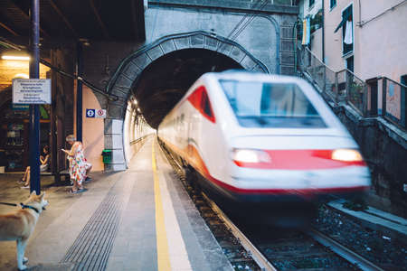 MANAROLA- ITALY: SEPTEMBER, 03 2016: High speed electric train at the railway stationのeditorial素材