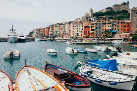 Beautiful colorful houses and boats in scenery italian village Portovenere. Travel backgroundの写真素材