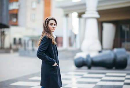 Young beautiful woman posing in city street. Urban lifeの写真素材