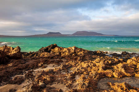 Beautiful landscape of volcanic island Lanzarote, Canary Islands, Spain. Travel destination. Sea background. Summer vacation concept.の写真素材