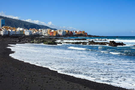 Scenic black sandy beach Jardin in Puerto de la Cruz, Tenerife, Canary Islands, Spainの写真素材