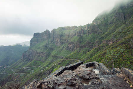 Serpentine road among beautiful mountains landscape in Tenerife, Canary island, Spain. Travel conceptの写真素材