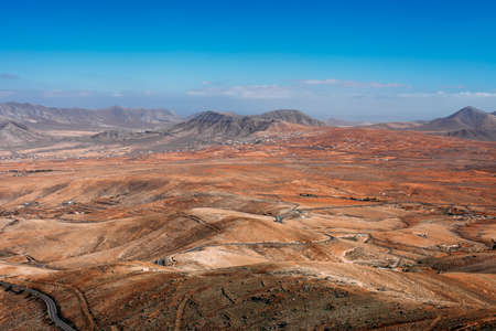 Beautiful top view panorama of volcanic mountains from the viewpoint Mirador de Morro Velosa in Fuerteventura, Canary Islands, Spain.の写真素材