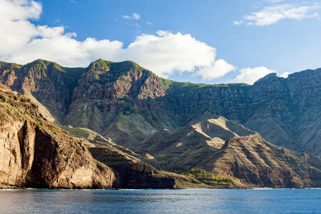 Scenic view of beautiful mountains landscape and atlantic ocean on Gran Canaria island. Nature backgroundの写真素材