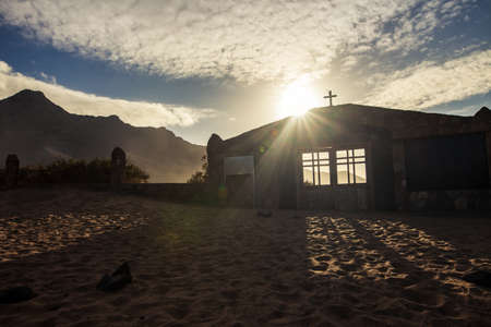 Ð¡hristian cemetery gate on sunset in Fuerteventura islandの写真素材