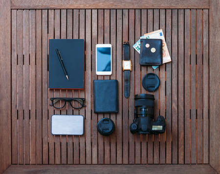 Man travel set and accessories on a wooden background. Top viewの写真素材