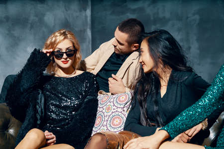 Diverse group of people enjoy party and have funの写真素材