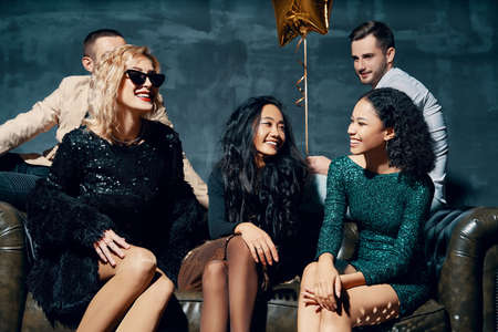 Diverse group of people enjoy party and have funの写真素材