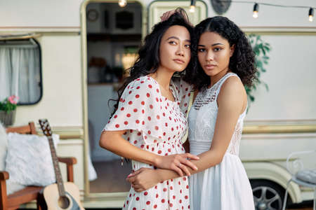 Two best friends embracing outdoors. Women friendship concept