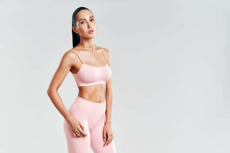 Portrait of sporty fitness woman in sportswear with copy spaceの写真素材