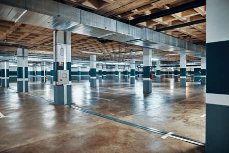 Underground parking interior. Empty garage. urban background