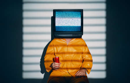 Surreal art of TV addicted man with television instead of head.の素材 [FY310190602527]