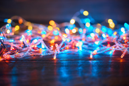 Colorful christmas lights background with copy space. Merry Christmas and Happy New Year festive compositionの写真素材