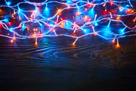 Colorful christmas lights background with copy space. Merry Christmas and Happy New Year festive compositionの写真素材