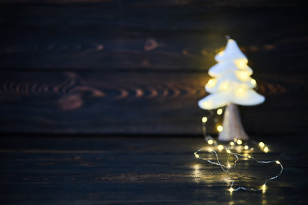 Christmas tree with christmas lights background with copy space. Merry Christmas and Happy New Year festive conceptの写真素材