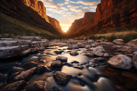 Grandeur of a river canyon. Water mirroring the warmth of the setting sun between towering cliffs. Generative AIの素材