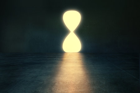 Bright glowing hourglass shaped hole in dark empty room.