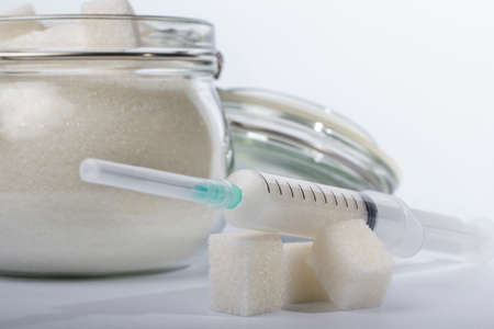 a syringe with sugarの写真素材