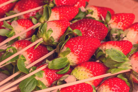strawberry on stick close upの写真素材