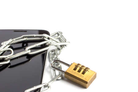 phone in hand wrapped chainの写真素材